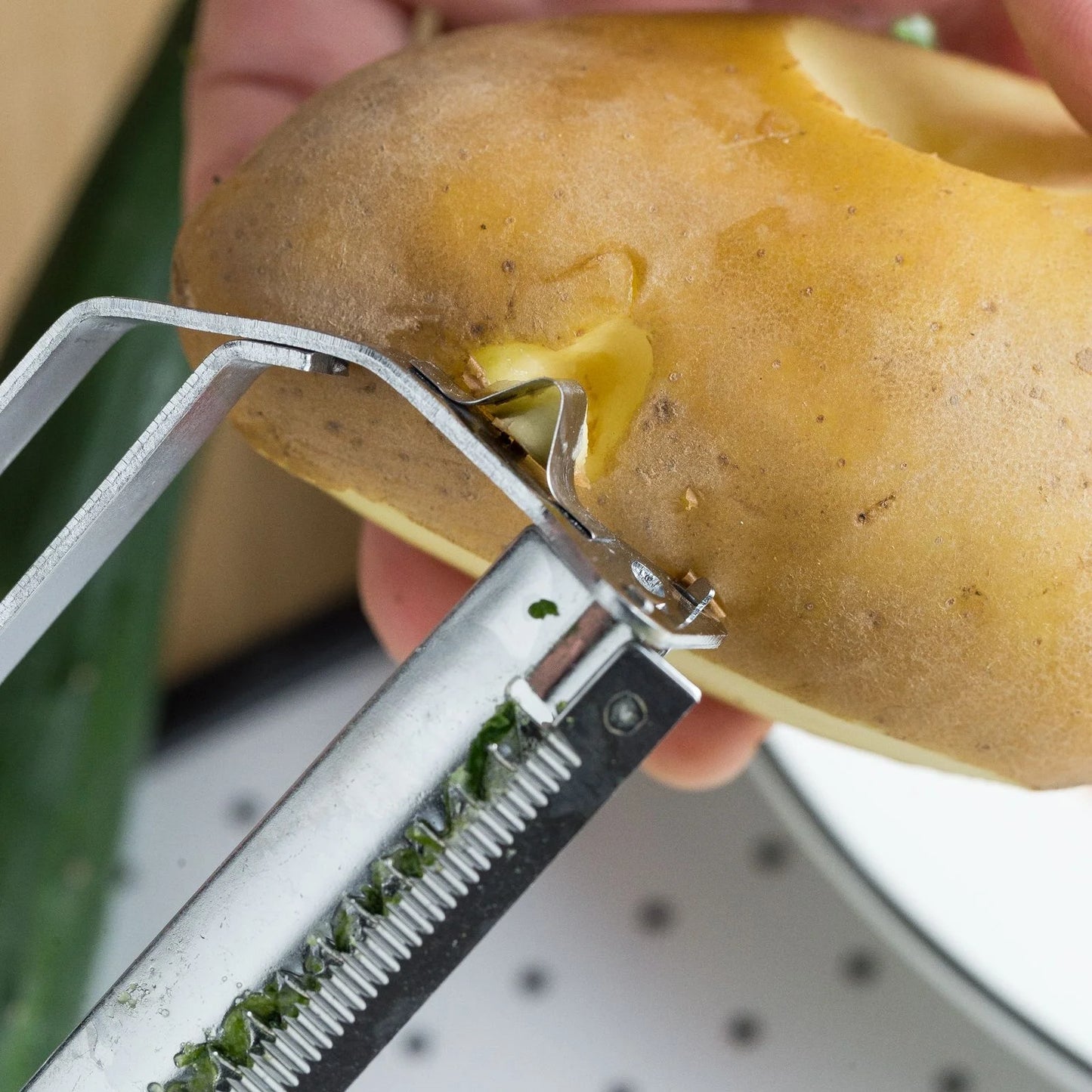 Éplucheur de légumes en acier inoxydable